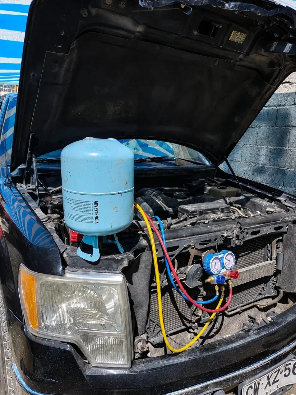 Carga gas A/C automotriz